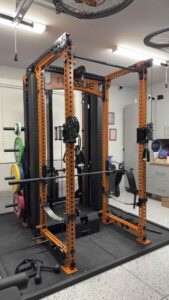 2 Rogue Monster Rhino Trainer Rack assembly in Walnut Creek